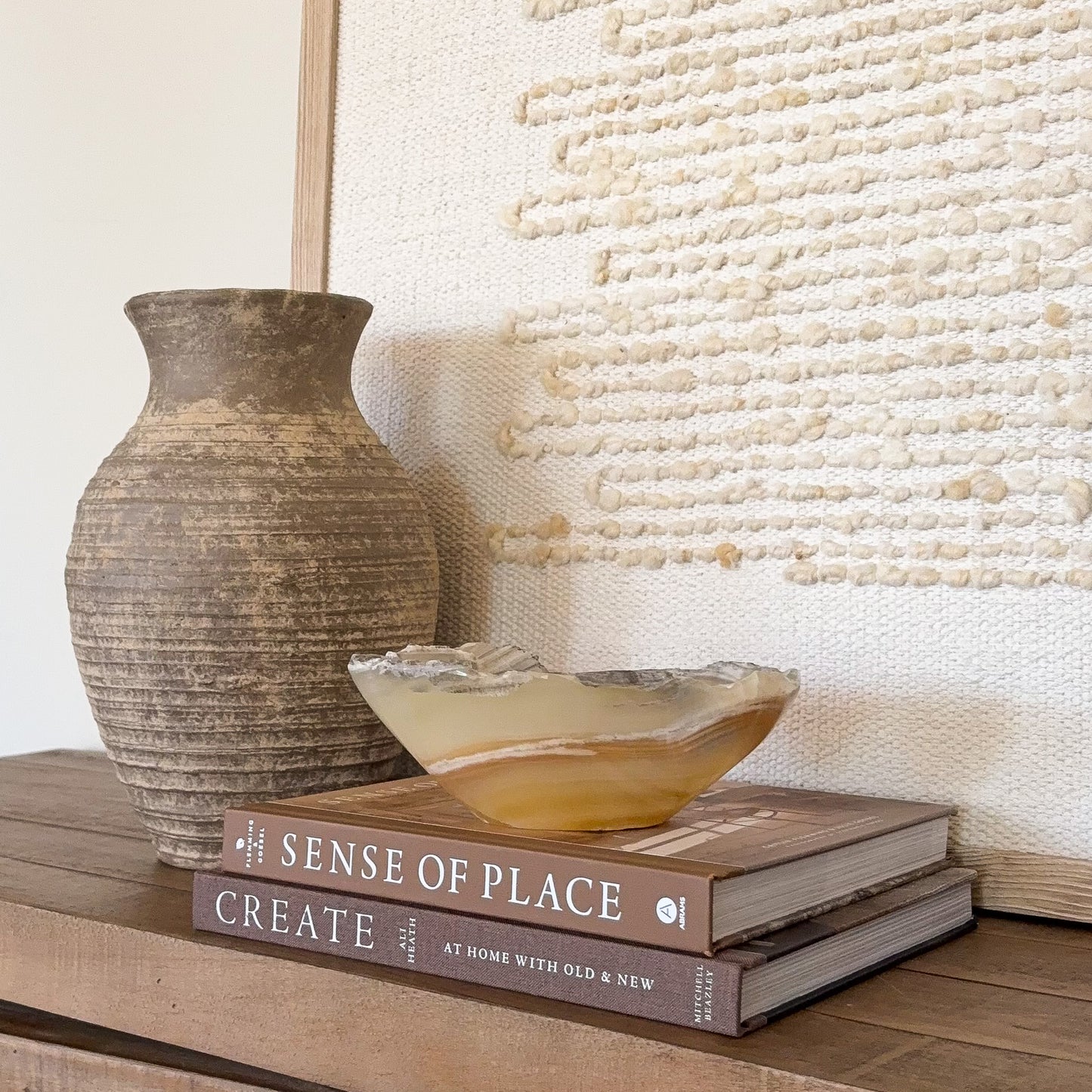 Small decorative amber onyx bowl carved from genuine banded onyx