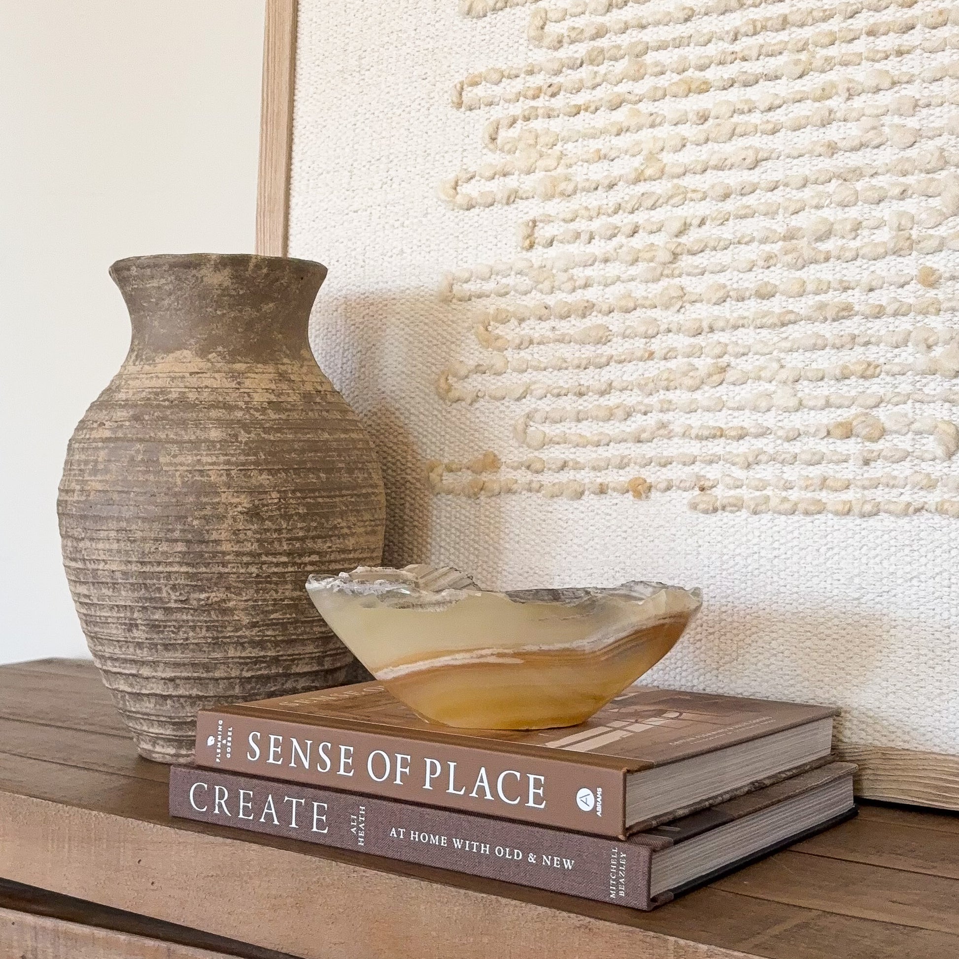Small decorative amber onyx bowl carved from genuine banded onyx
