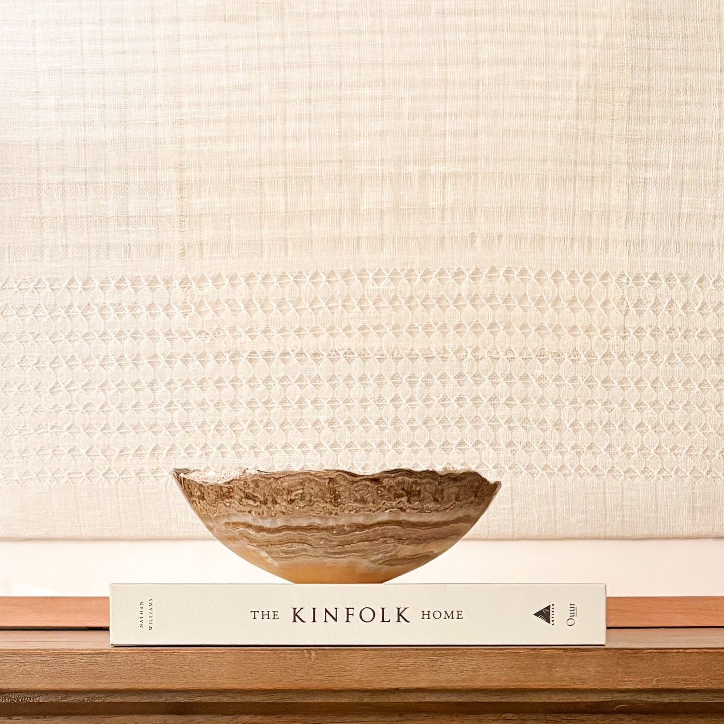 Small amber onyx bowl handcrafted from polished natural stone