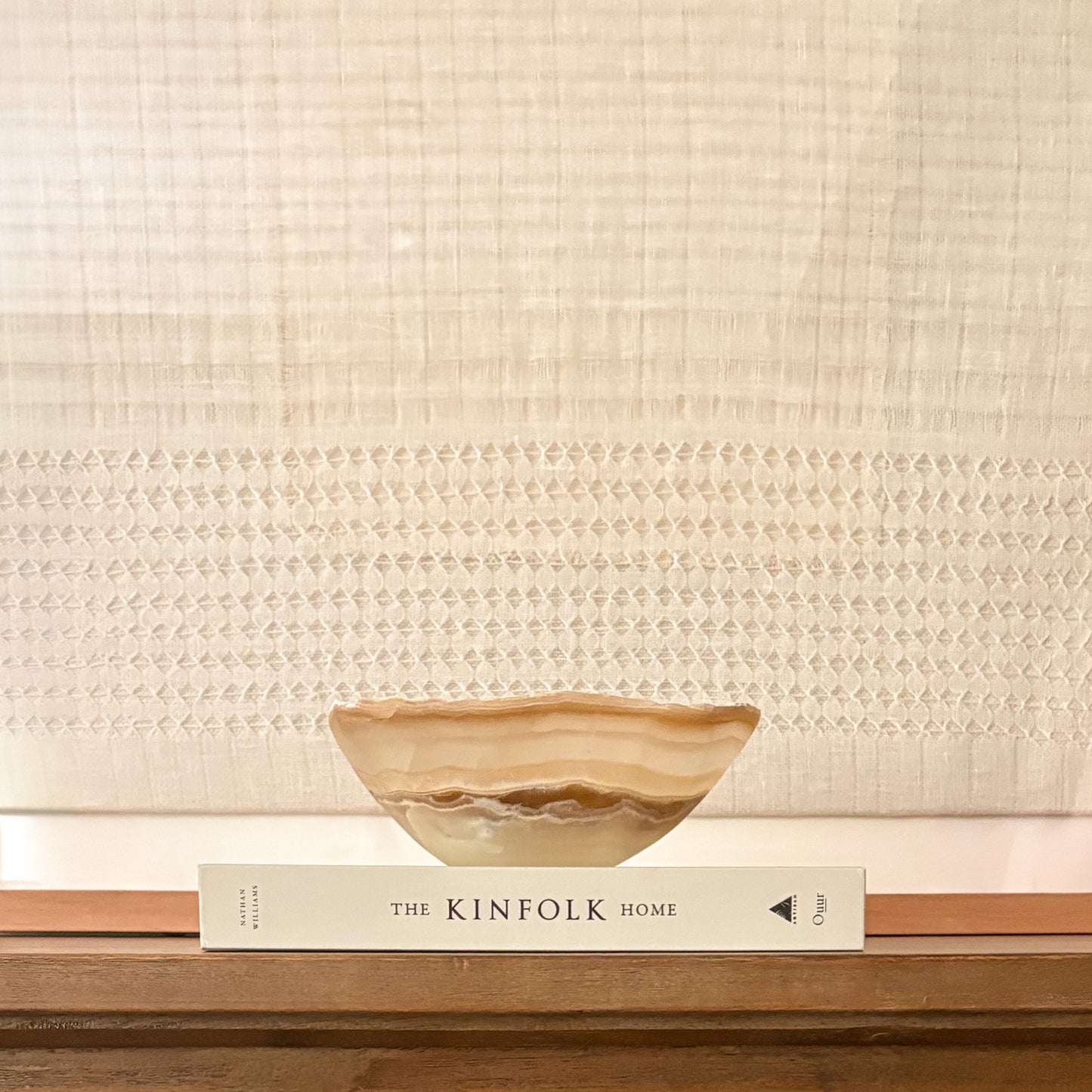 Small amber onyx bowl handcrafted from polished natural stone