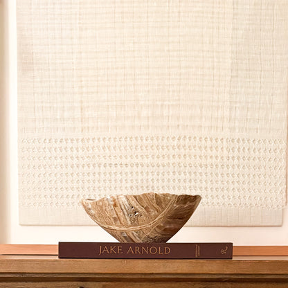 Natural amber onyx decorative bowl with warm golden veining and hand-carved finish