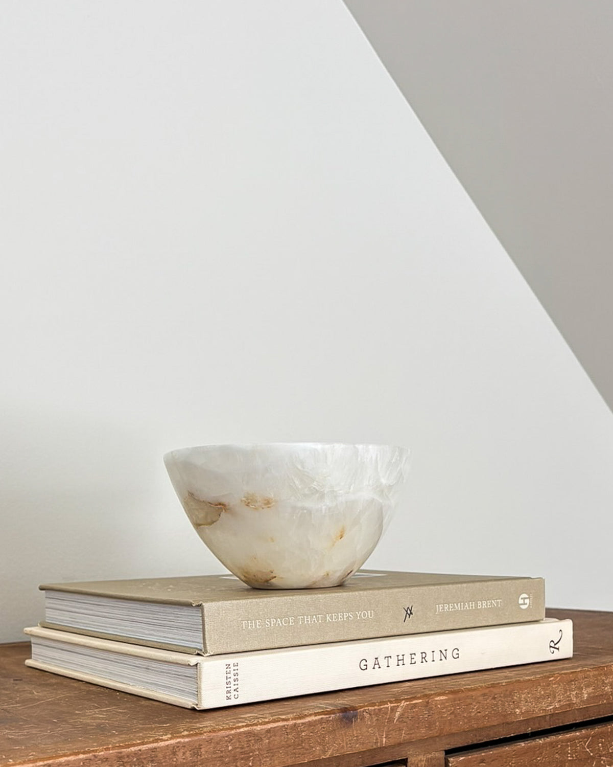 Small amber onyx stone bowl with natural translucent layers and unique veining
