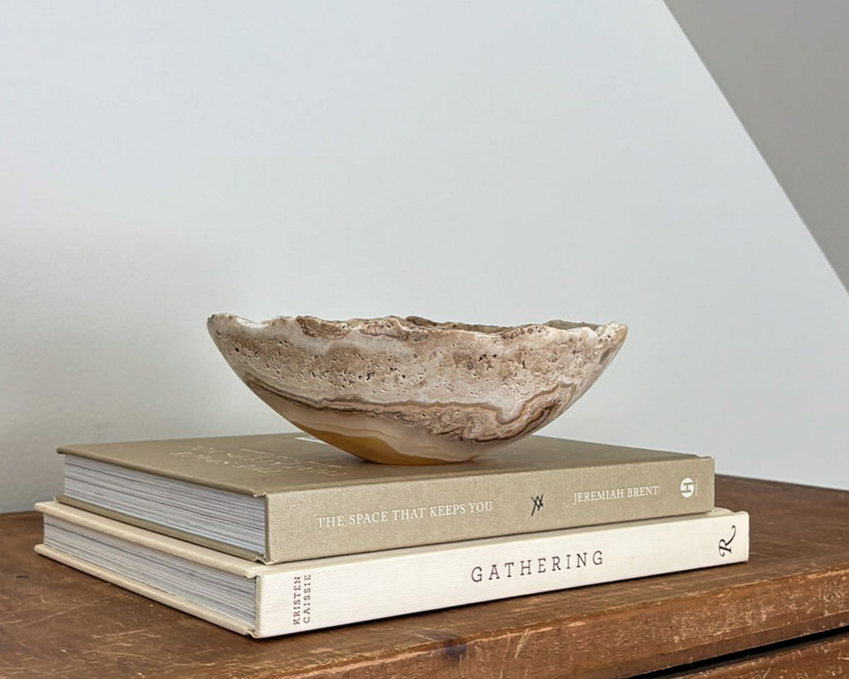 Small hand-carved amber onyx bowl with natural golden honey and cream veining