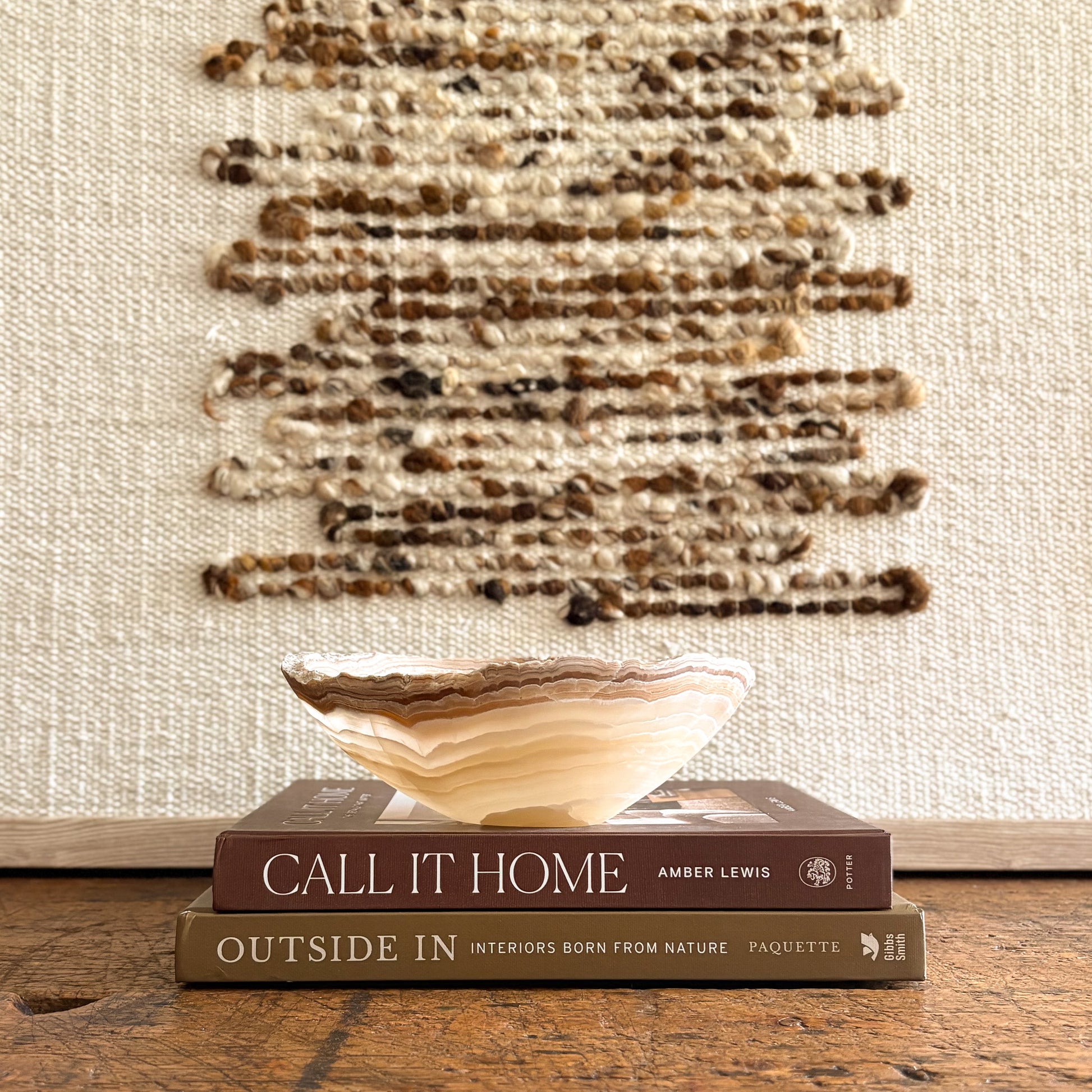 Polished amber onyx bowl with organic striations, small handcrafted décor piece
