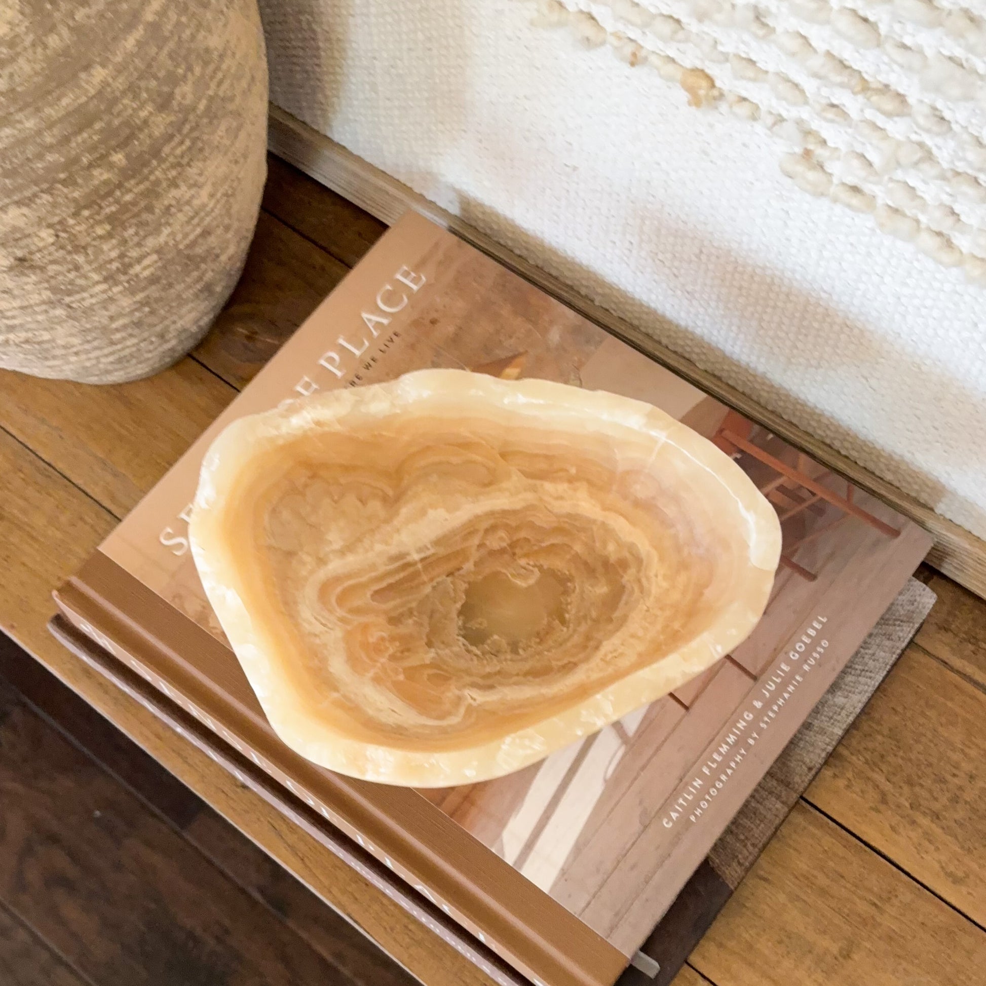 Small decorative amber onyx bowl carved from genuine banded onyx