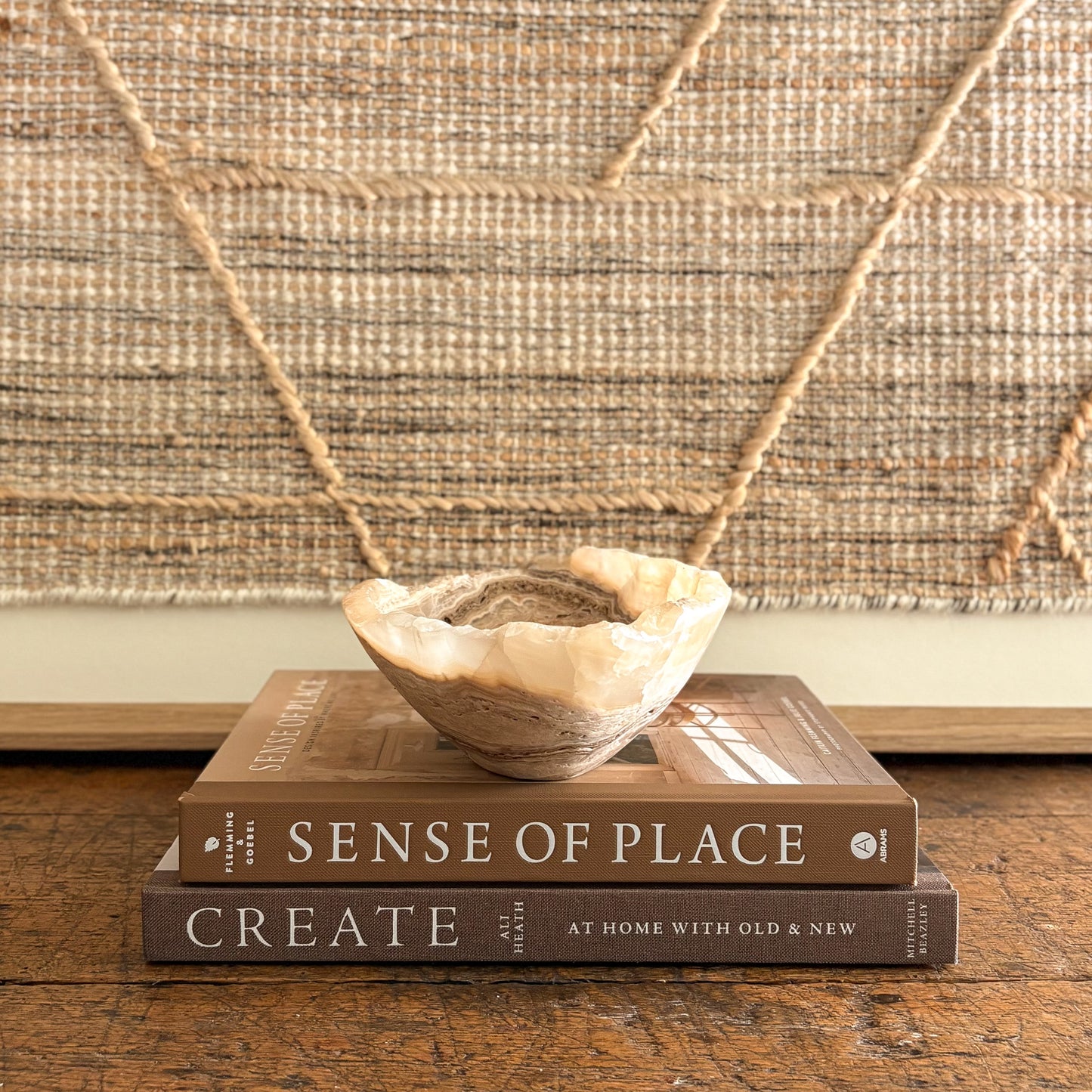 Amber onyx bowl carved by hand, translucent stone with natural striations