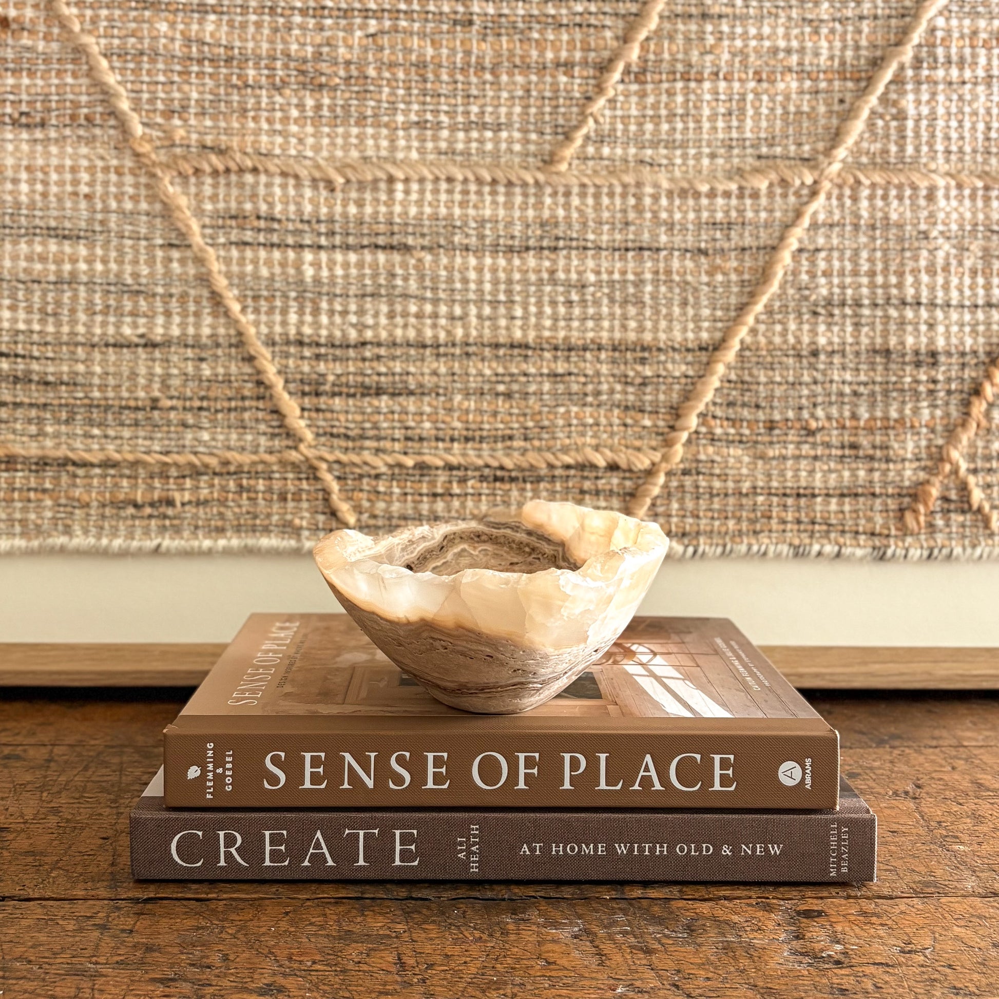 Amber onyx bowl carved by hand, translucent stone with natural striations