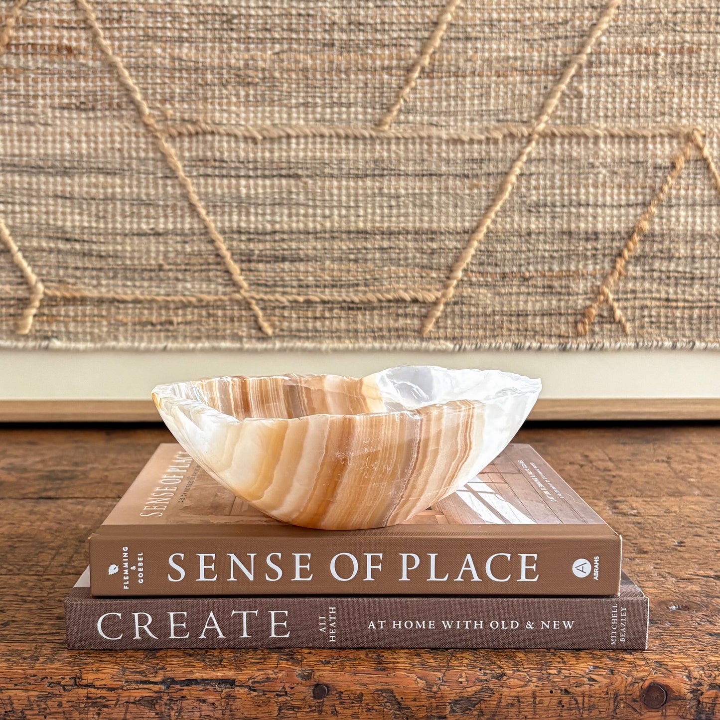 Hand-carved amber onyx bowl with warm honey bands, polished interior