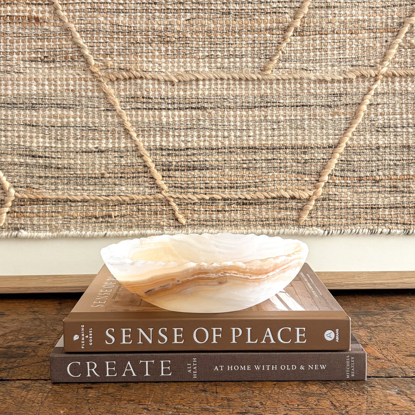 handmade amber onyx bowl on tabletop, warm golden glow