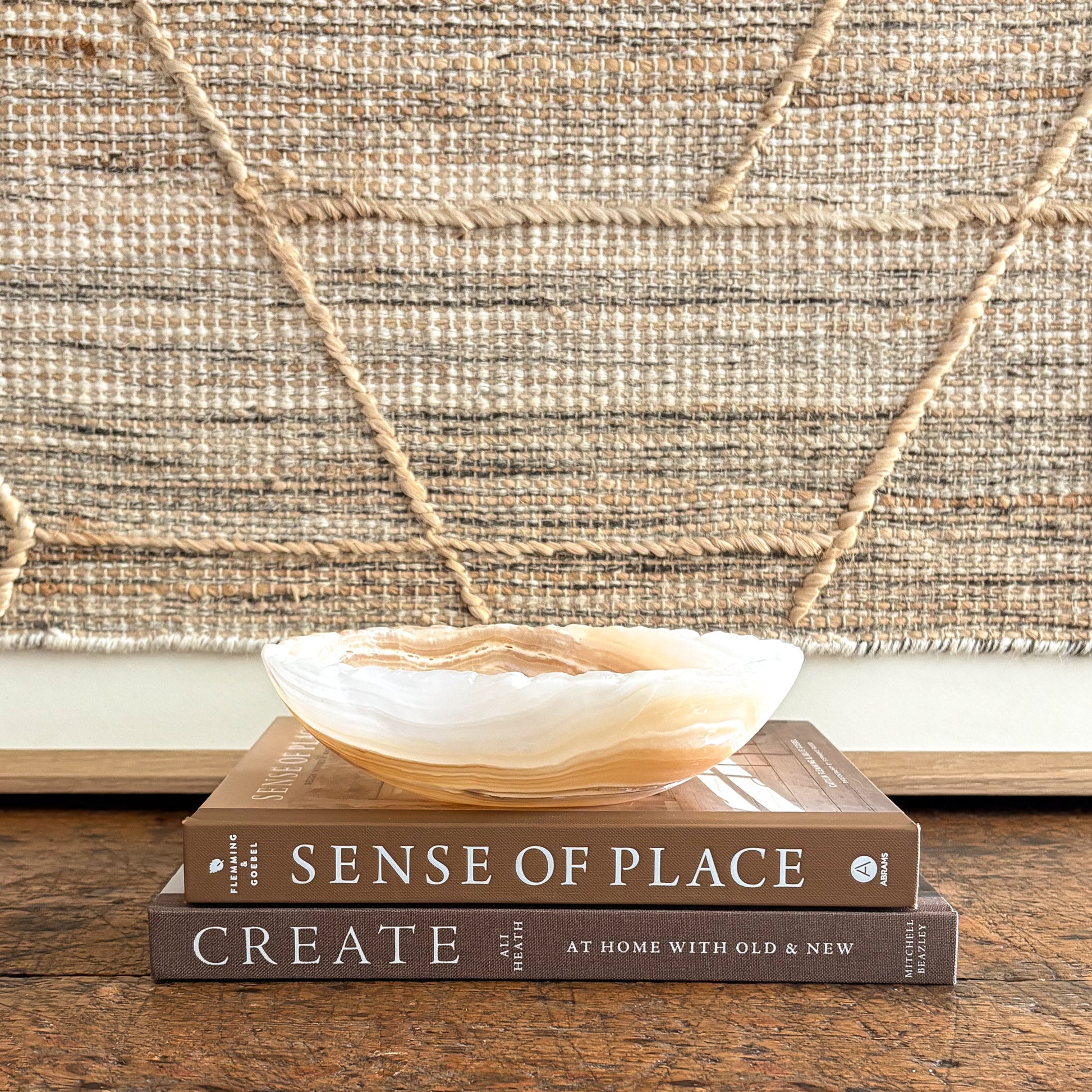 Small hand-carved amber onyx catchall bowl, luminous banded stone