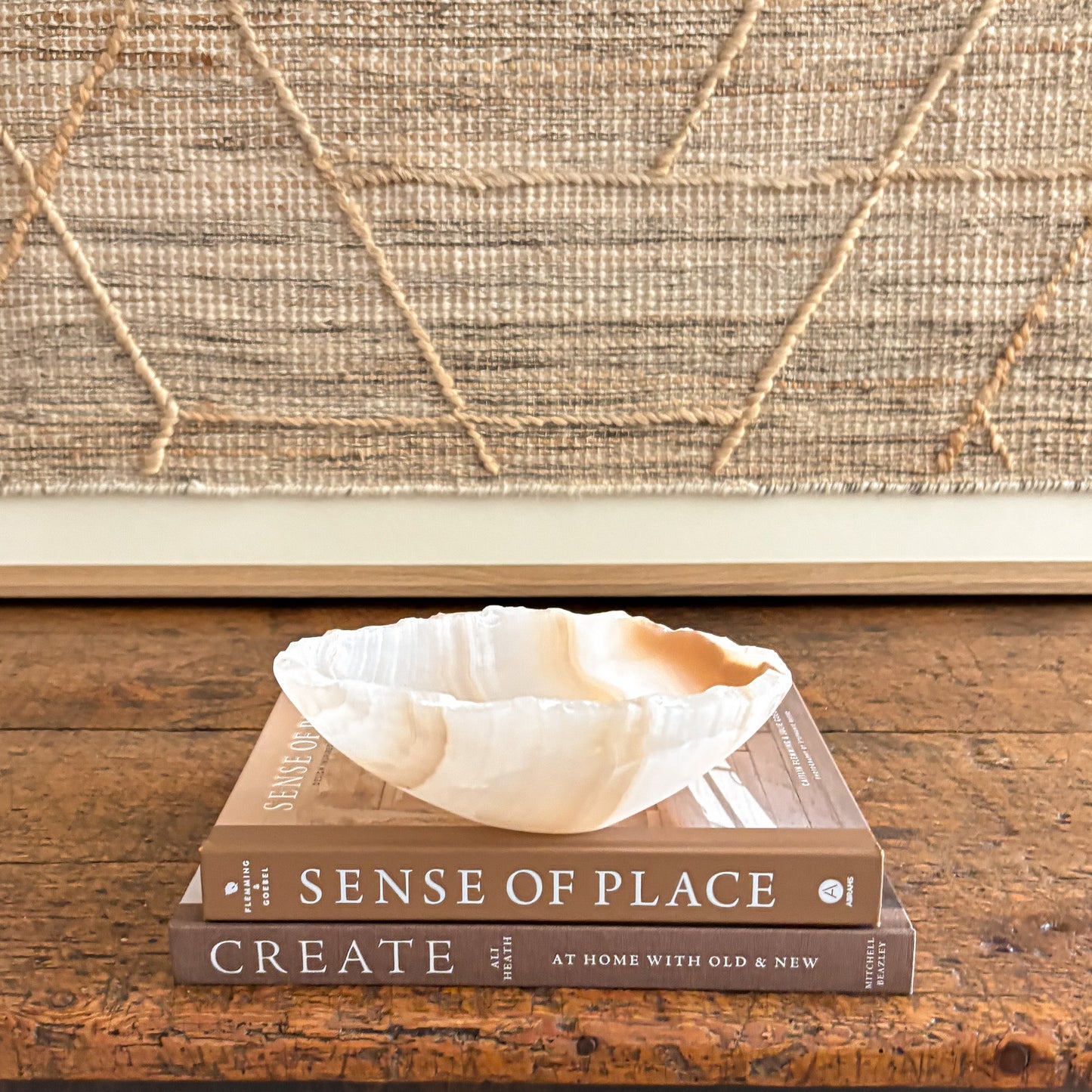 Amber onyx bowl carved by hand, translucent stone with natural striations