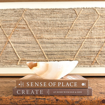 Amber onyx centerpiece bowl, hand-carved with natural stone striping