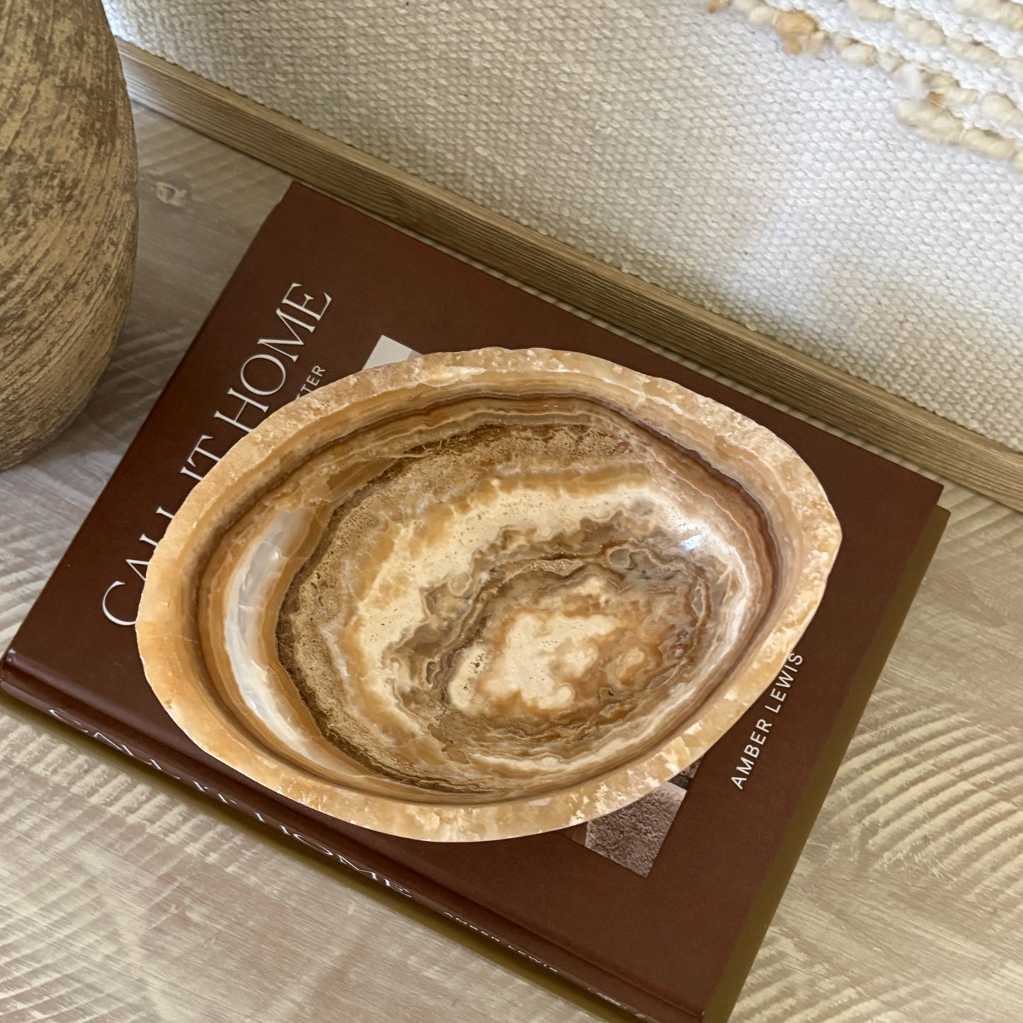 Artisan carved amber onyx bowl in neutral stone tones