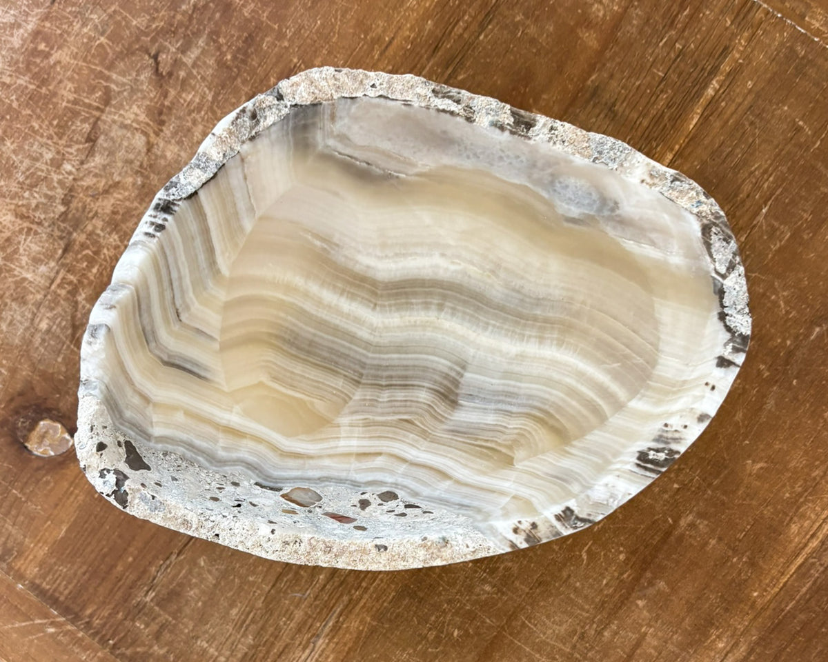 Hand-carved natural grey onyx stone bowl with smooth polished finish
