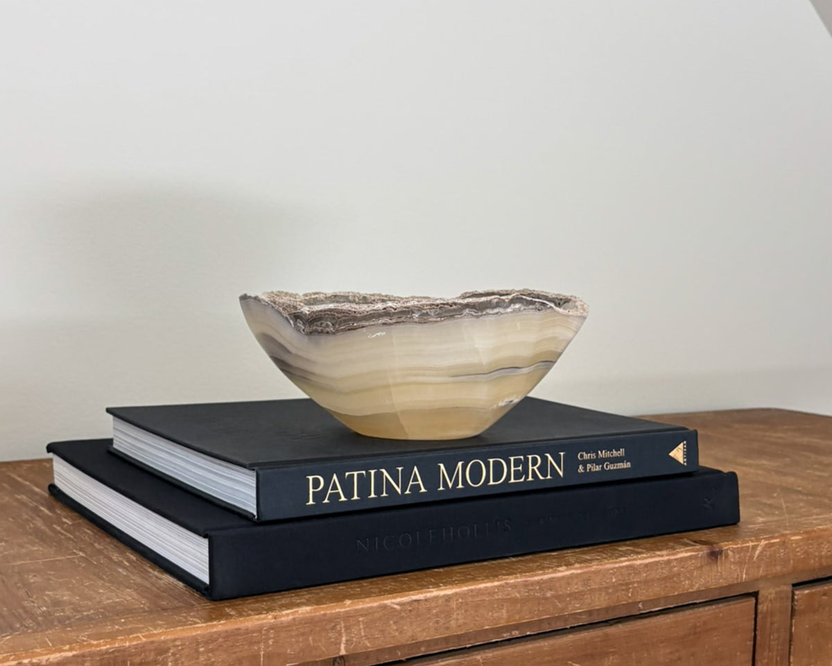 Grey onyx catchall bowl with natural veining and sculptural form