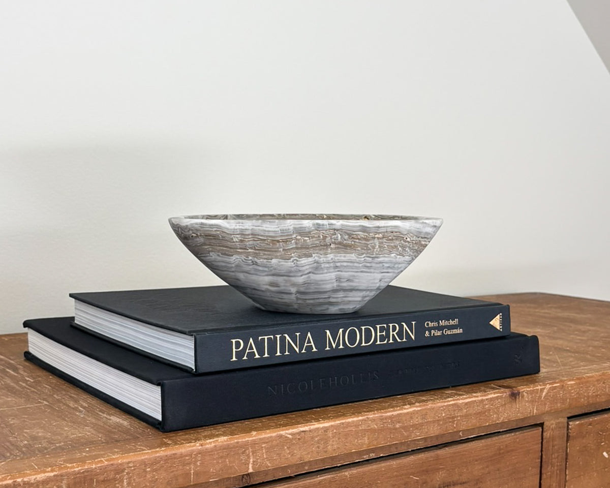 Grey onyx catchall bowl with natural veining and sculptural form