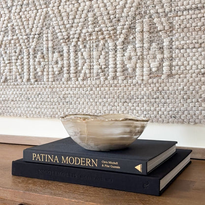 Small hand-carved grey onyx bowl with natural stone veining for home decor