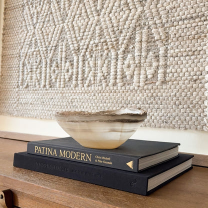 Small hand-carved grey onyx bowl with natural stone veining for home decor