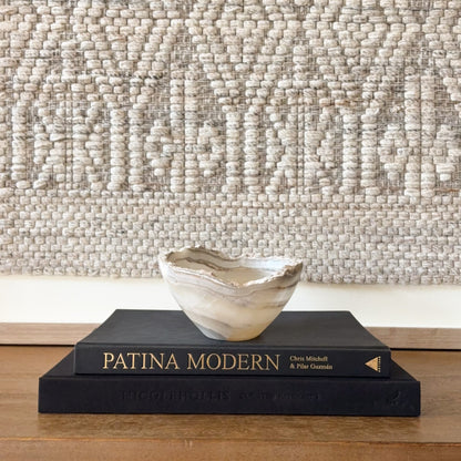 Small grey onyx bowl handcrafted from natural stone with smooth finish