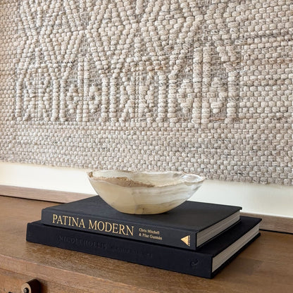 Small polished grey onyx bowl carved from solid natural stone