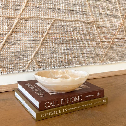 Small hand-carved grey onyx bowl with natural stone veining for home decor