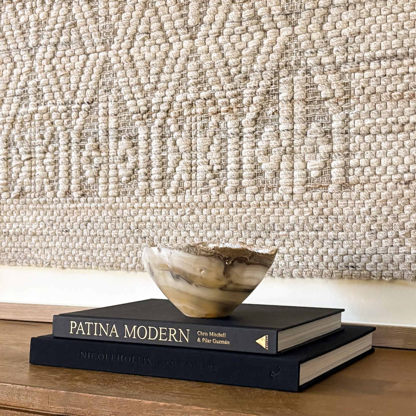 Decorative stone bowl styled in minimalist living space