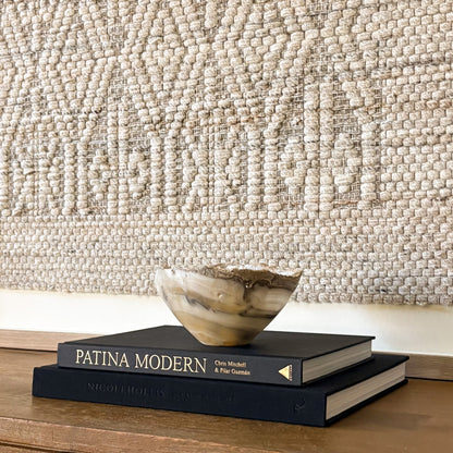 Decorative stone bowl styled in minimalist living space