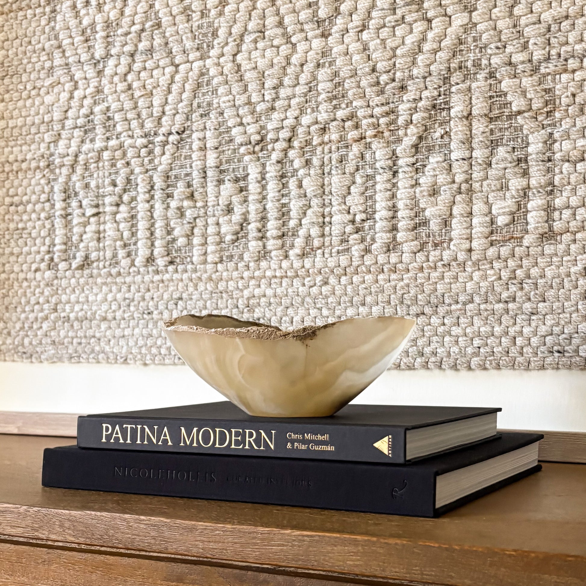 Hand carved grey onyx bowl with unique patterns, ideal for jewelry or trinket display