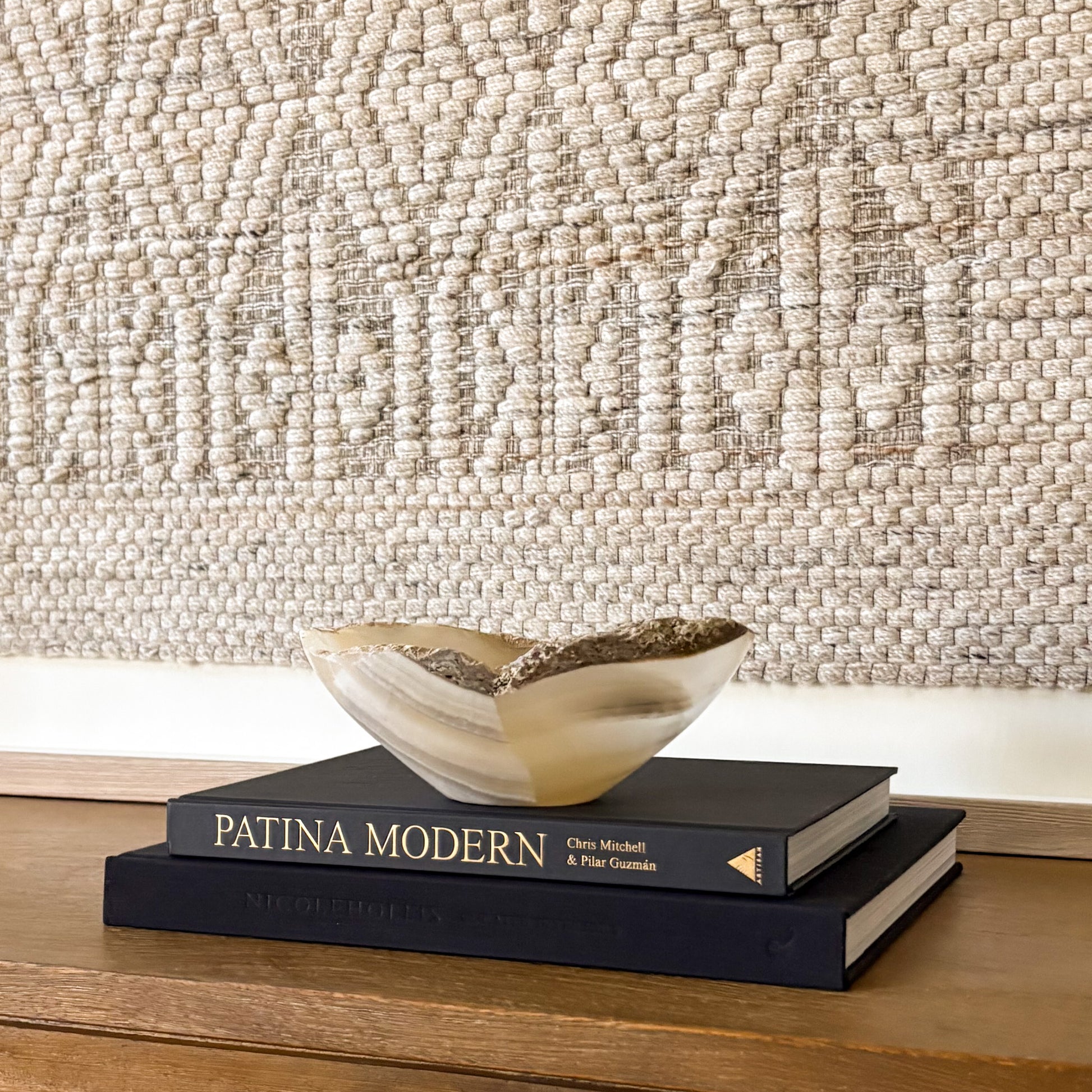 Artisan hand carved small grey onyx bowl featuring natural stone variations and smooth finish