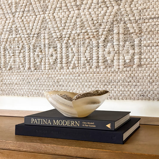 Artisan hand carved small grey onyx bowl featuring natural stone variations and smooth finish