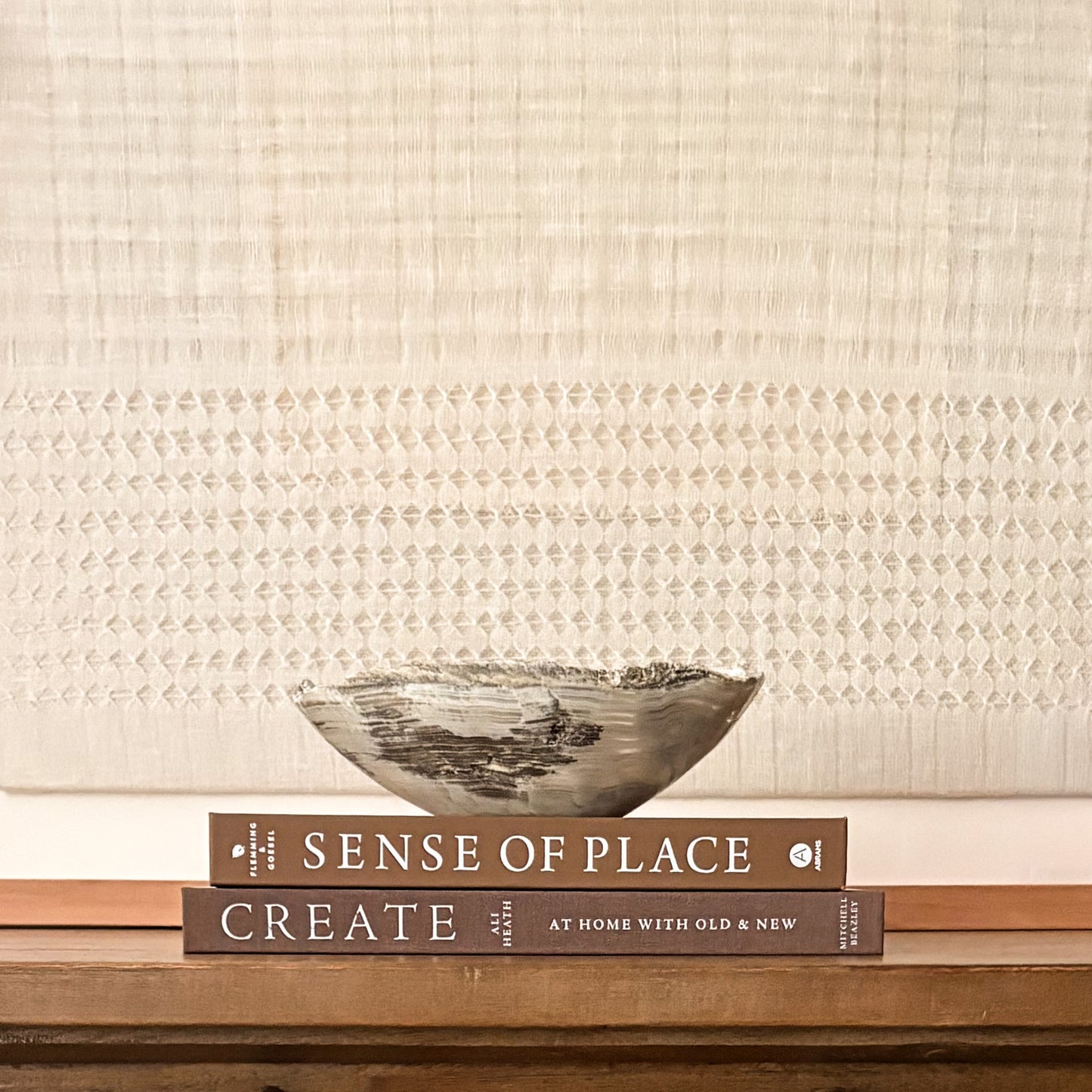Sculptural grey onyx bowl showcasing unique veining and hand-carved craftsmanship.