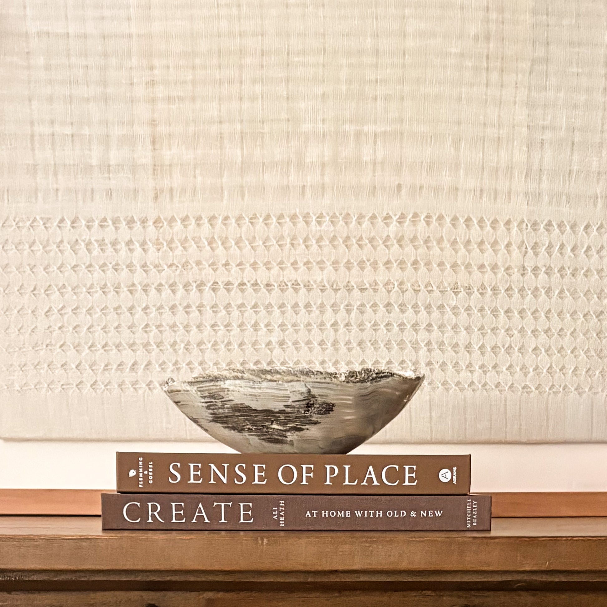 Sculptural grey onyx bowl showcasing unique veining and hand-carved craftsmanship.