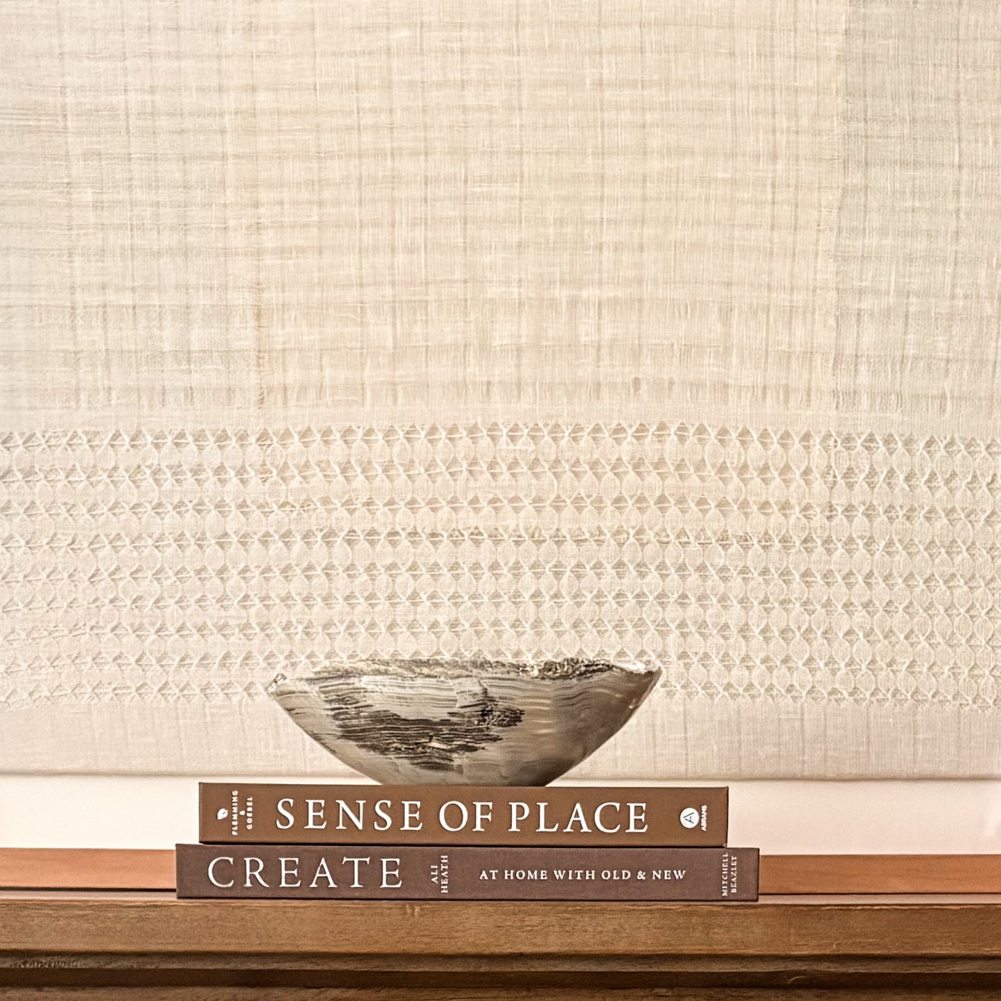 Decorative hand-carved grey onyx centerpiece bowl with natural stone variations.
