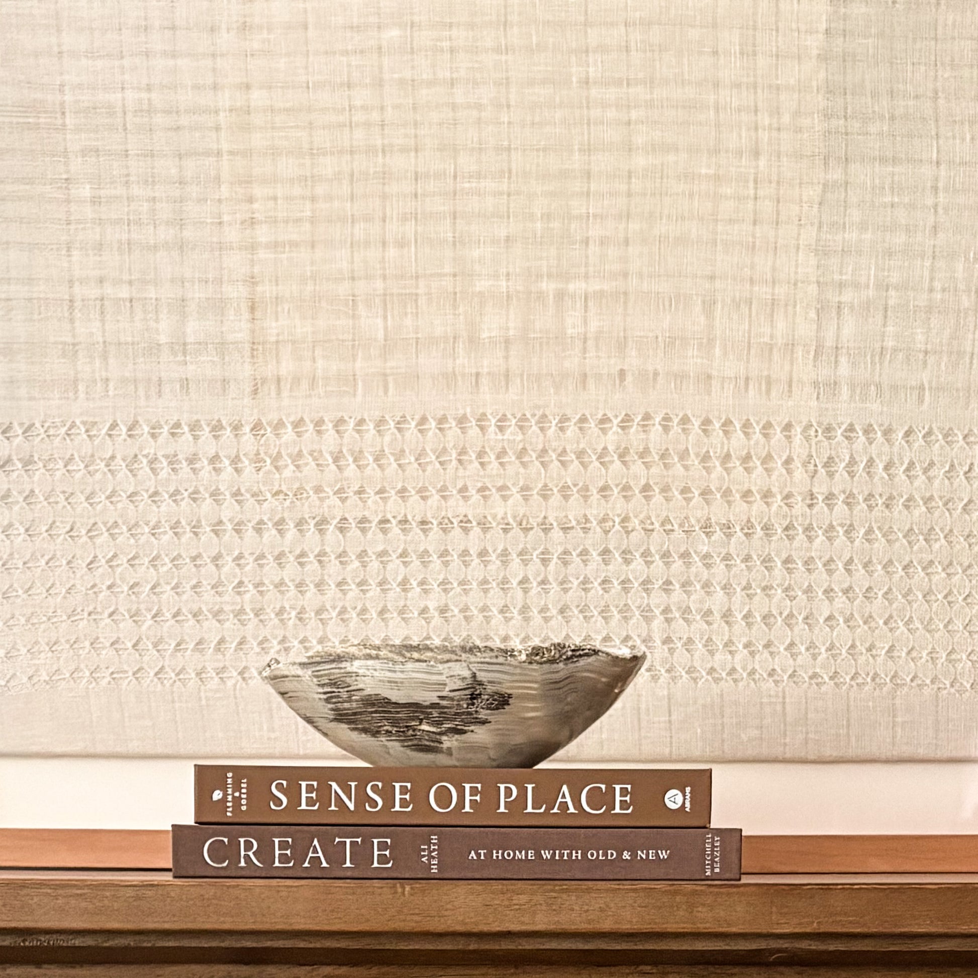 Decorative hand-carved grey onyx centerpiece bowl with natural stone variations.