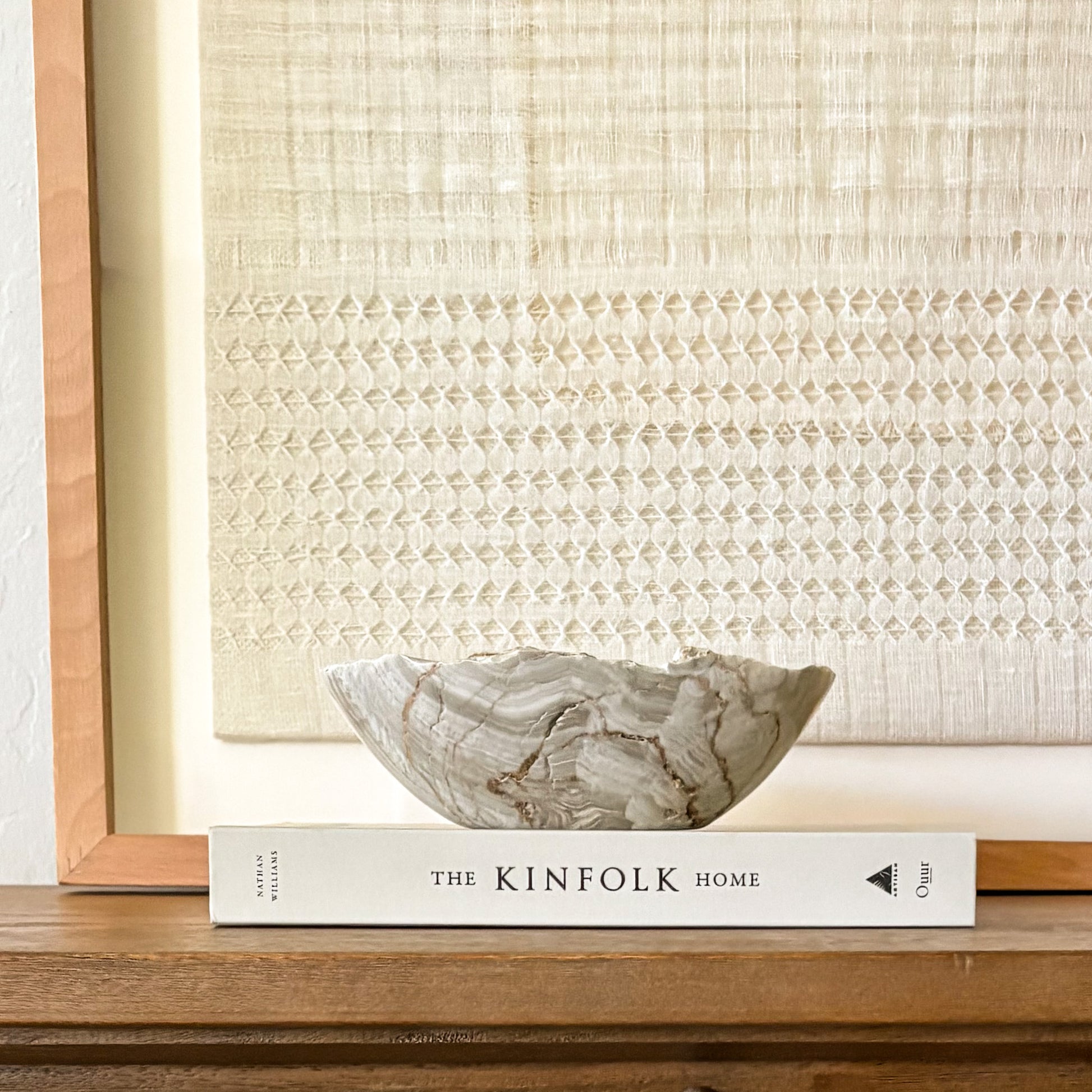Luxury hand-carved grey onyx bowl featuring natural stone patterns and organic texture.