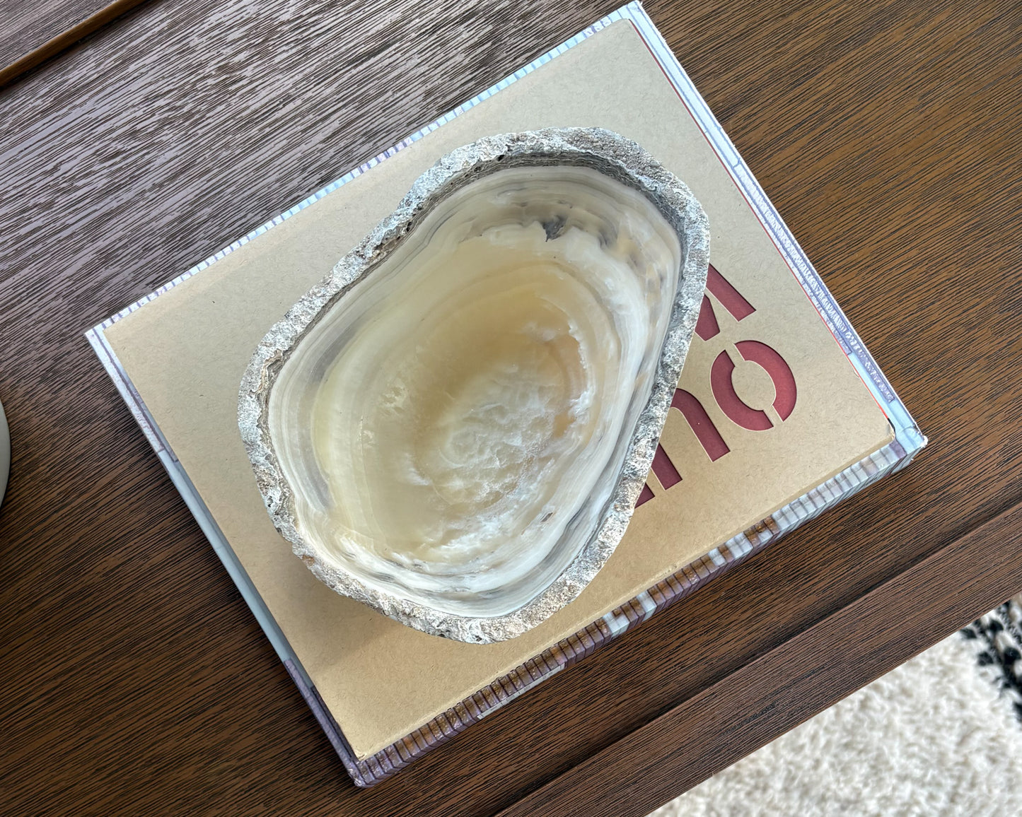 Artisan hand-carved grey onyx stone bowl with unique veining