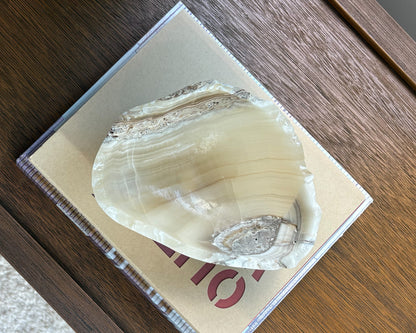 Natural grey onyx bowl with translucent stone patterns