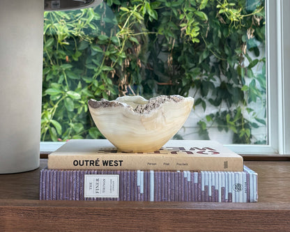 Artisan hand-carved grey onyx stone bowl with unique veining