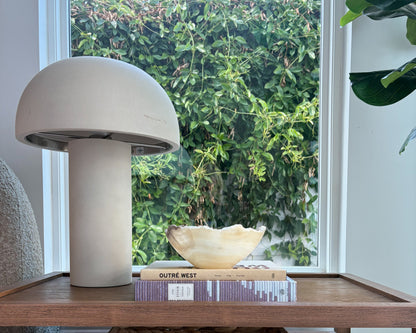 Natural grey onyx bowl with translucent stone patterns