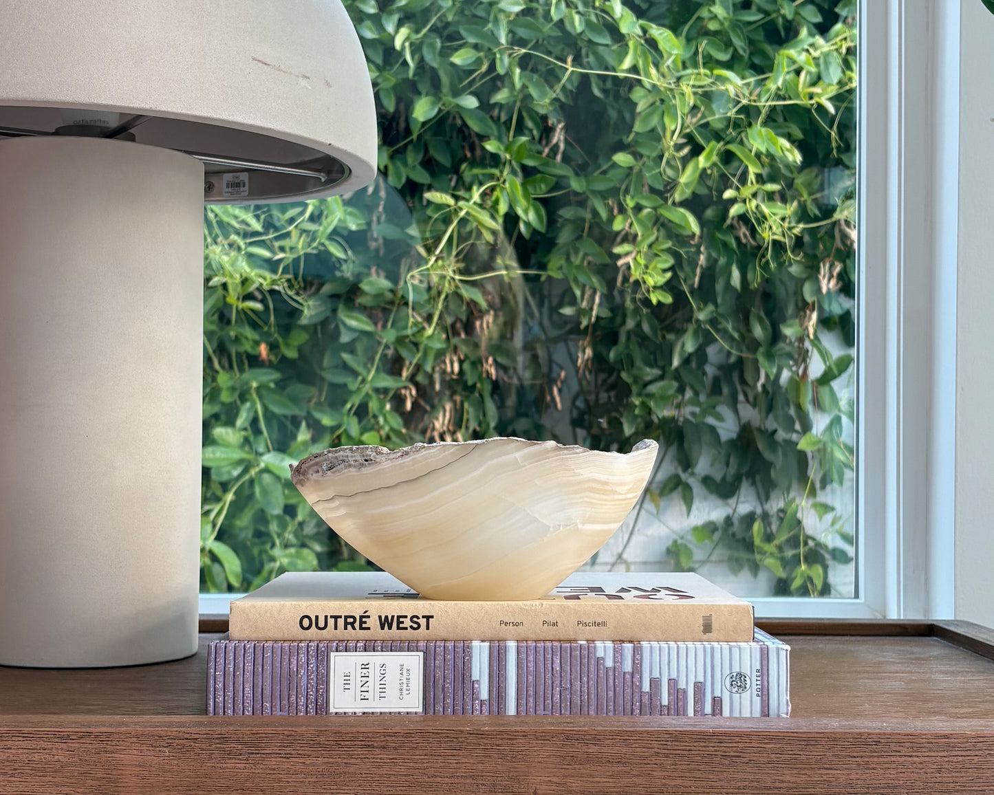 Hand-carved grey onyx bowl with natural stone veining