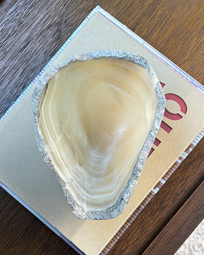 Artisan hand-carved grey onyx stone bowl with unique veining