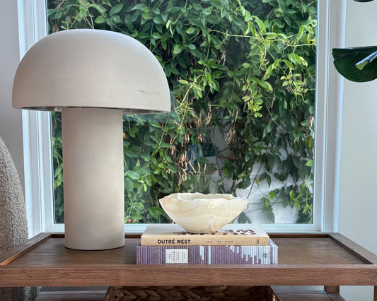Hand-carved white onyx bowl with natural stone veining