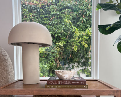 Polished white onyx stone bowl with natural variations