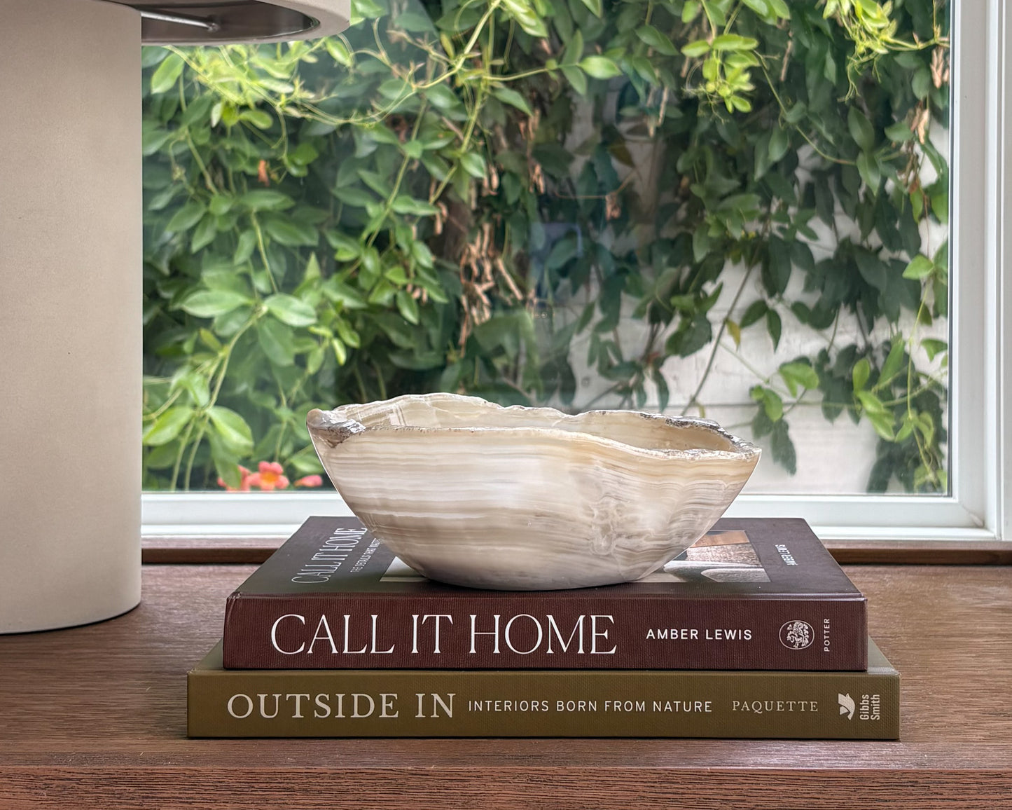 Hand-carved white onyx bowl with natural stone veining