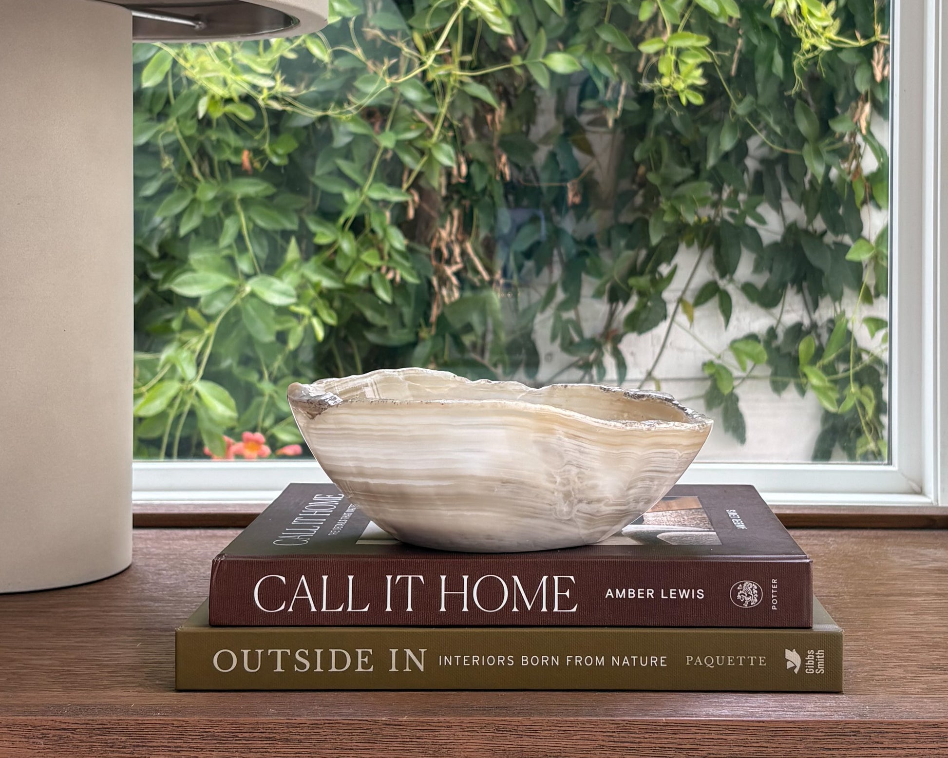 Hand-carved white onyx bowl with natural stone veining