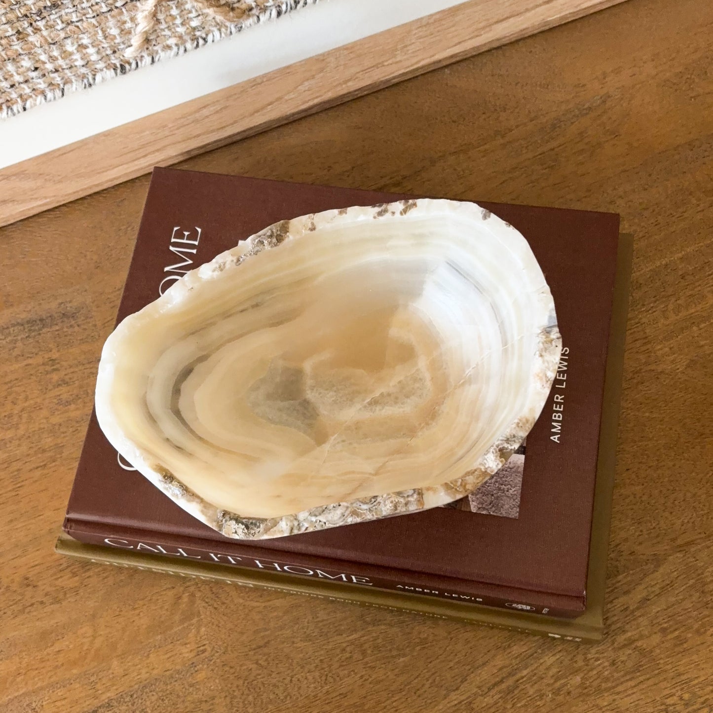 Small hand carved amber onyx bowl, natural banded stone dish in warm beige and golden hues for jewelry or decorative display