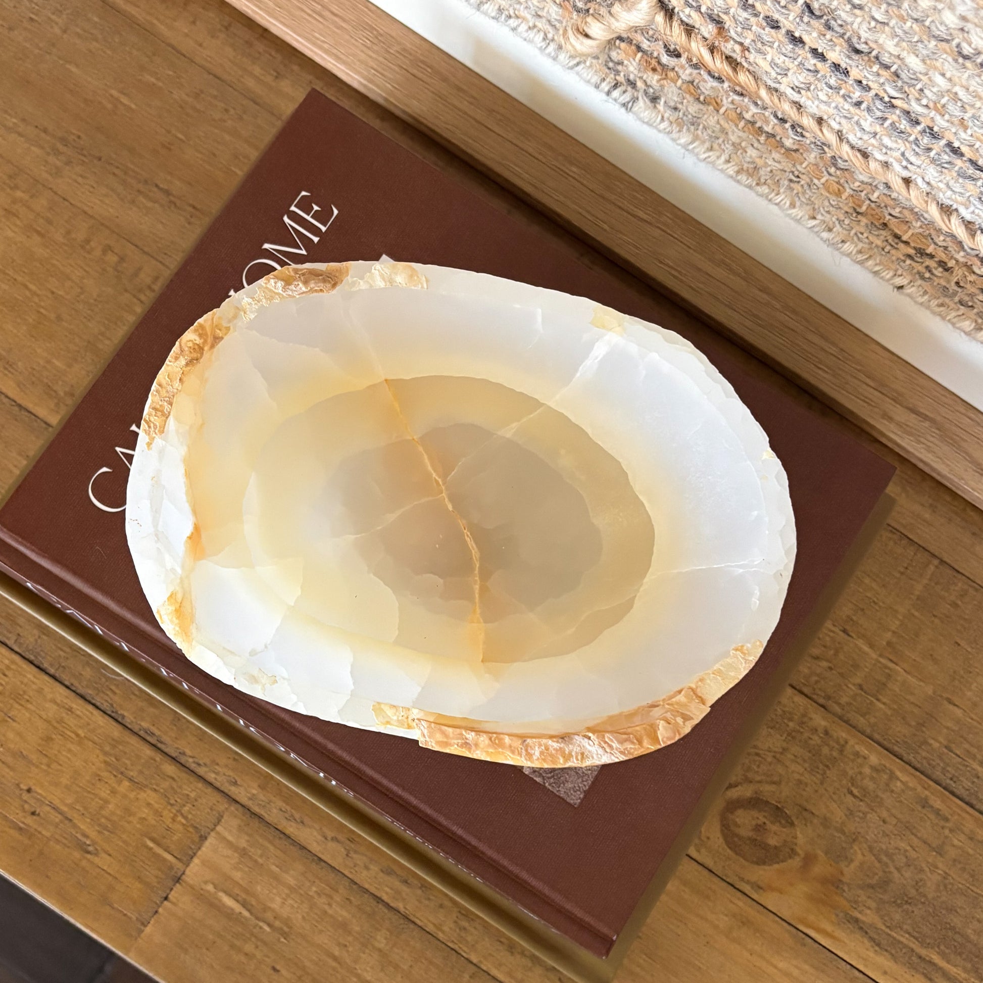 Decorative small amber onyx bowl made from natural stone