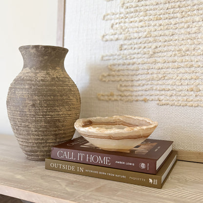 Decorative small amber onyx bowl made from natural stone