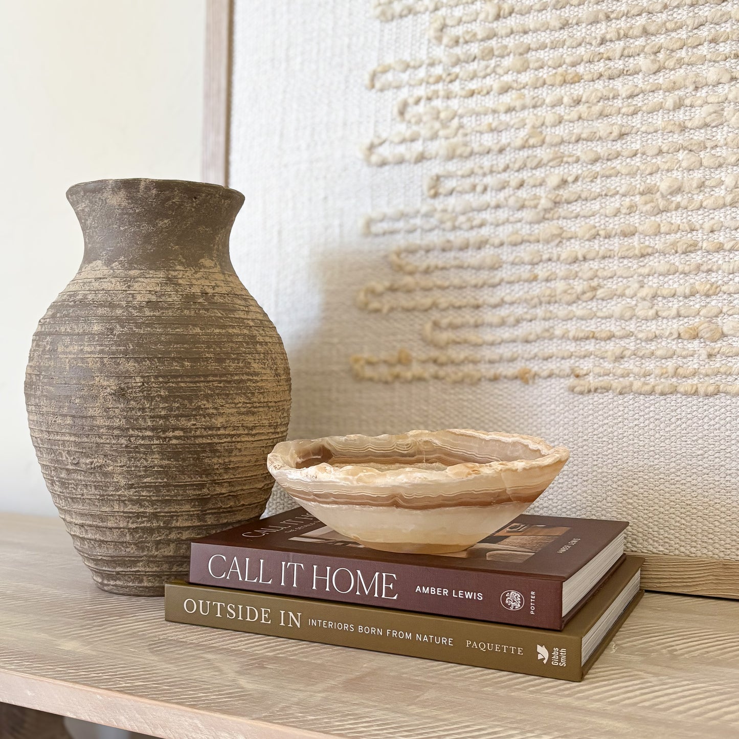 Artisan carved amber onyx bowl in neutral stone tones