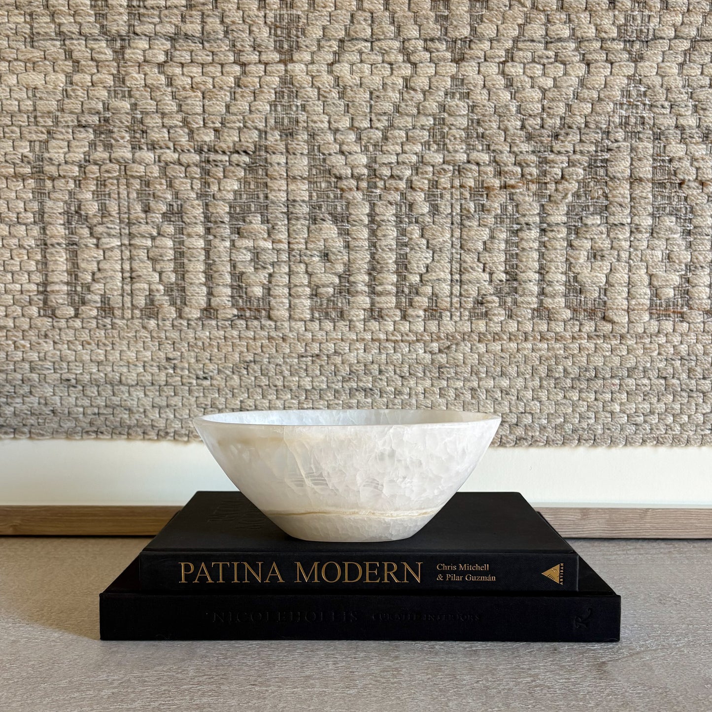 Small hand-carved white onyx bowl in natural stone, luxury decorative accent with soft veining